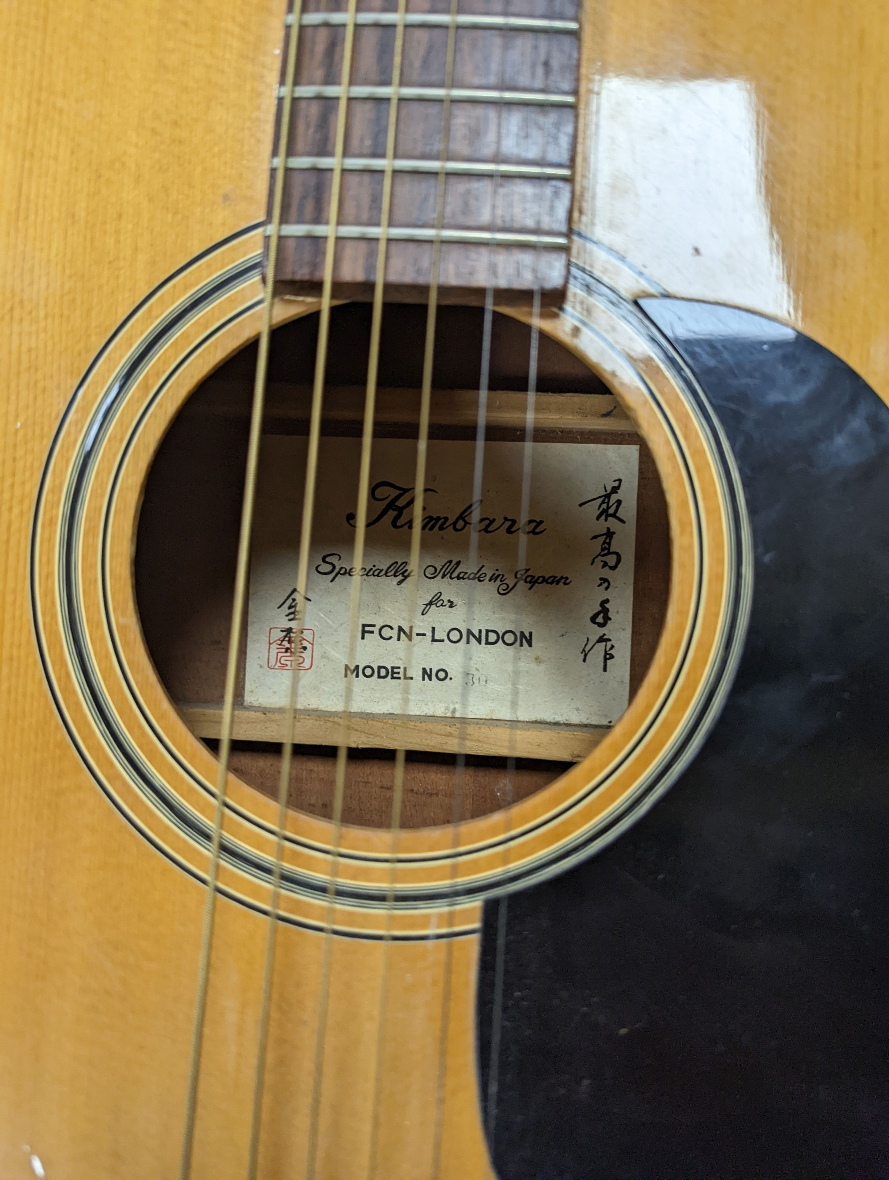 A Kimbala acoustic guitar.